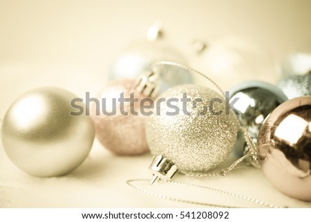 ball christmas decorations in blurred style on mulberry paper texture for christmas and new year background