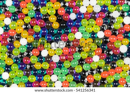 Colorful glass polka dots sweet jell candy isolated on seamless background / celebration funny gelatin transparent water balls for party day texture