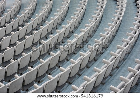 Empty rows of theater or movie seats.