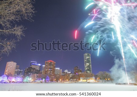 Fireworks Explode over Loring Park and Minneapolis Skyline for a Winter Holiday Celebration