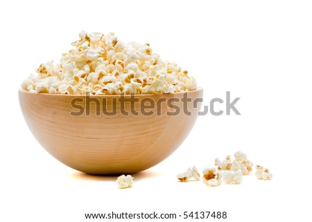 Delicious popcorn in bowl over white background Royalty-Free Stock Photo #54137488