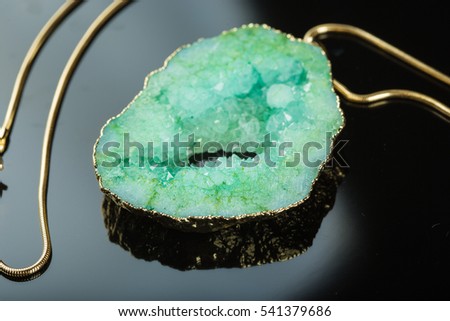 green gem necklace Royalty-Free Stock Photo #541379686