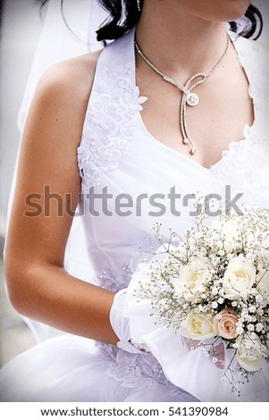 Wedding picture. Bouquet. Dress. Bride.