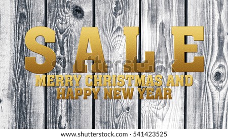 Sale - Merry Christmas and Happy New Year on wooden background