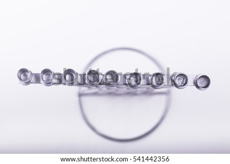 Image of jewish holiday Hanukka with silver Menorah (top view) on white background