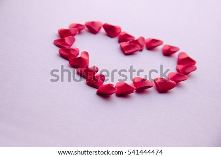 Heart made from small paper hearts Origami. Valentine's Day.  Ã�Â¡lose-up. Love Background for design. 