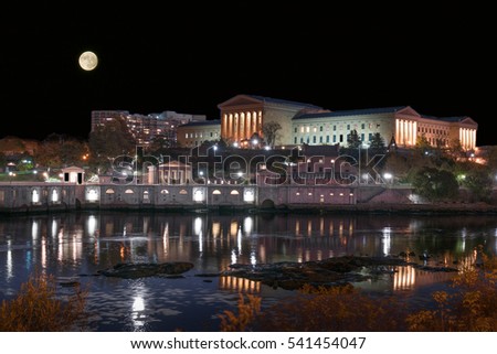 Moon over the Philadelphia Art Museum and historic Fairmount waterworks along the Schuylkill river.