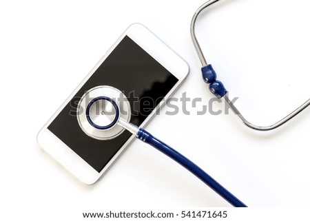 diagnostic of gadgets on white background with stethoscope