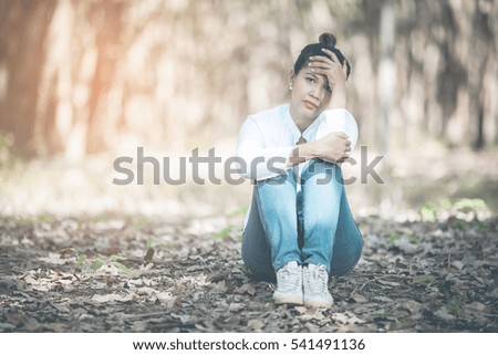 woman sitting in the park