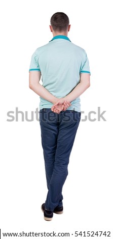 Back view of handsome man in polo looking up.   Standing young guy in jeans. Rear view people collection.  backside view of person.  Isolated over white background. Royalty-Free Stock Photo #541524742