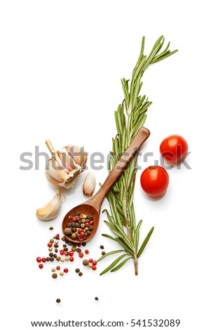 Healthy Food & drink diet & Italian lifestyle: Mediterranean vegetable herbs & spice healthy cuisine. Italian herb rosemary garlic red cherry tomato & peppers. Top view Isolated on white  Royalty-Free Stock Photo #541532089