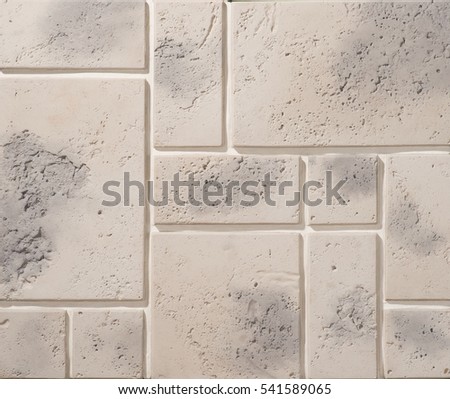 Stone and brick facades of buildings, stone and brick backgrounds and textures for designers and 3D modeling