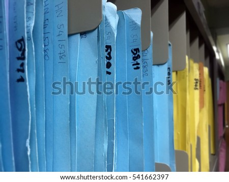 Close up customer papers data on shelf