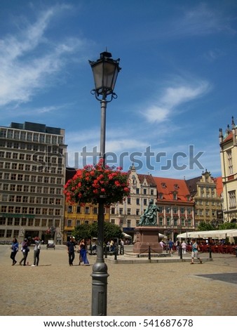 photos with landscape background architecture of the town hall buildings in the historic center of Wroclaw on the Market square as the source for design and print