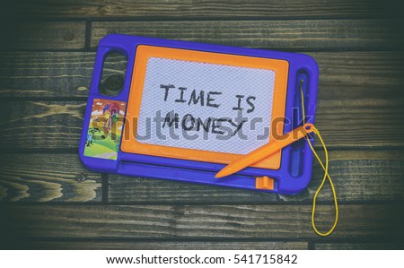 Child paint pad, word on paper sticker time is money