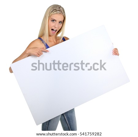 Beautiful young lady pointing to a sign board which she is holding