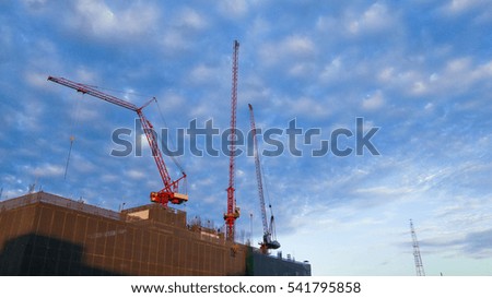 Construction hight building in Bangkok Thailand at silhouette time and blue sky