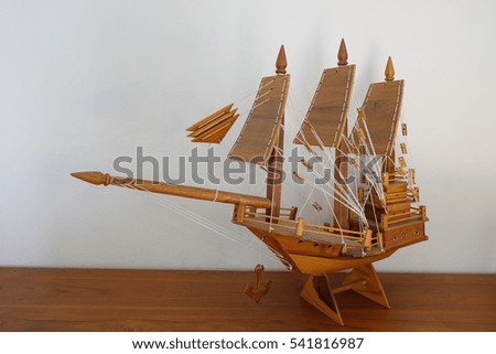 wood boat models show on table