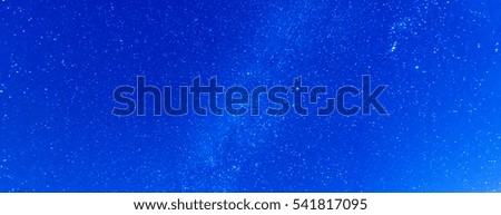 Panorama Sky and Stars, Long exposure photograph, with grain and select white balance.Night sky.