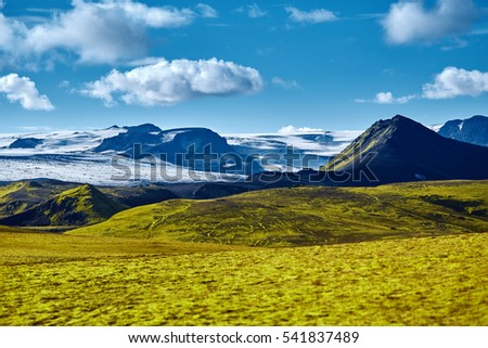Travel to Iceland. Beautiful Icelandic landscape with mountains, sky and clouds. Trekking in national park Landmannalaugar