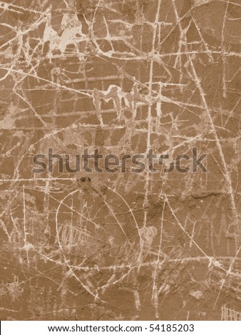 Brown scratching grunge wall with scrawl Royalty-Free Stock Photo #54185203