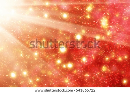 Red  Abstract Christmas Background with Rays and Golden circle glitter or bokeh lights. Round gold defocused particles