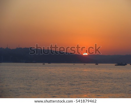 sunset at istanbul boshorus with european side silouhette