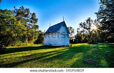 historic chapel building with sunset Royalty-Free Stock Photo #541954819
