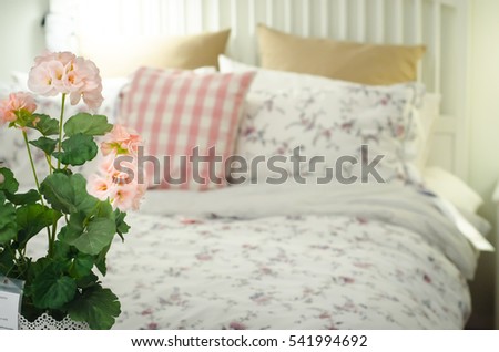 Flowers and blurred bedroom background - can used for display or montage your products.
