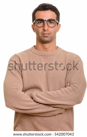 Young handsome man isolated against white background