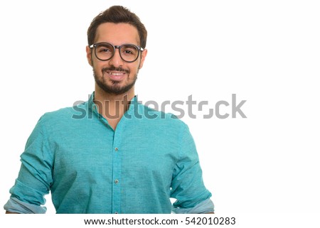 Young happy Indian man smiling isolated against white background