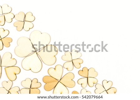 background with wooden hearts, place for text / vintage wooden hearts placed nicely on white seamless background / Vertical shot of a retro wood heart isolated over white