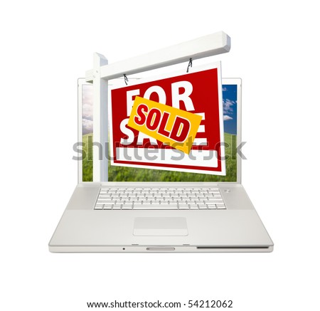 Sold For Sale Real Estate Sign on Computer Laptop Isolated on a white Background.