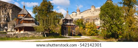 View of the old wooden church and a castle in Kamenetz Podolsky, Ukraine, Europe