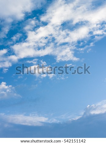 Large white clouds in the blue sky