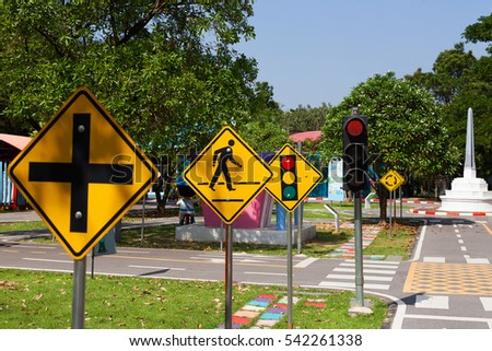 Traffic signs teach your child to the park. Traffic light