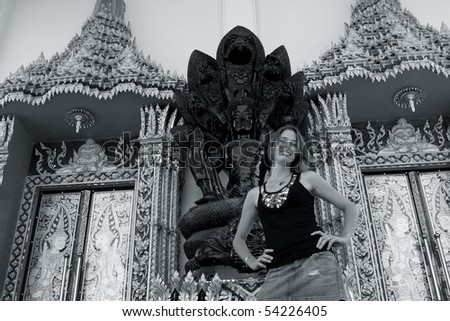 Tourist at a Thai temple - travel and tourism.