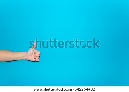 Thumbs Up on a blue background