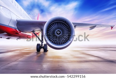 airliner on a airfield Royalty-Free Stock Photo #542299156