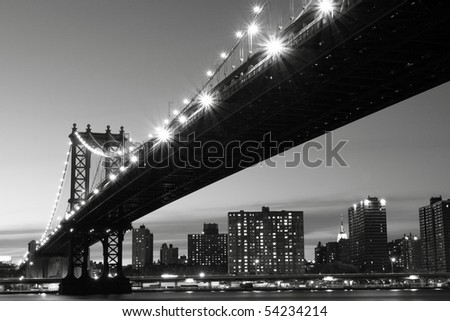 New York City Skyline and Manhattan Bridge At Night