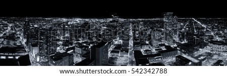 Aerial drone panorama.  Cityscape of the capital city of Denver Colorado at night. 