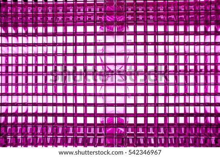 violet blue white squares arranged in horizontal and vertical lines with gradient effect, dark grid against white light, close-up of movie illuminant toned to blue color