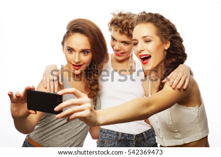 life style and people concept: girls best friends taking selfie