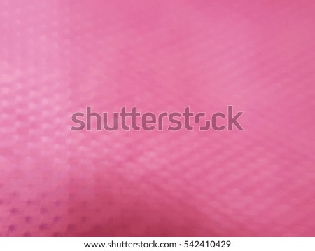 Blurred pink fabric texture background