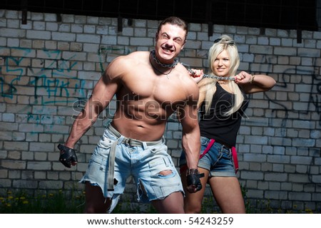 Young muscular man with his girlfriend