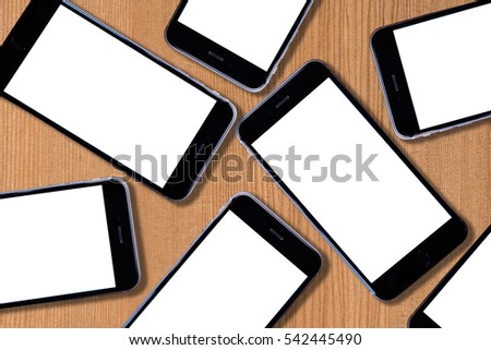 Group of Smartphone with blank white screen On Wooden Table for mocup you display montage