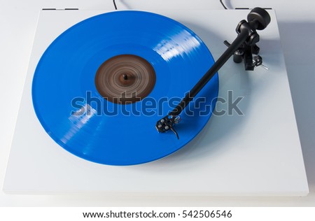 Vinyl player playing lp disc