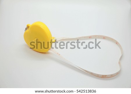 yellow tape measure in the white screen 