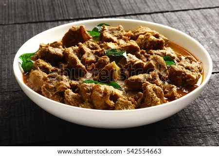 Homemade Indian mutton korma served in bowl, Royalty-Free Stock Photo #542554663