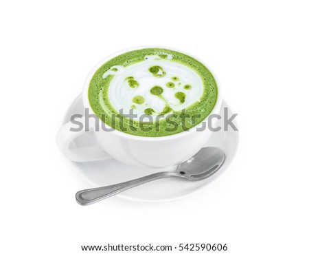 Hot matcha latte art with cute dog face cartoon on glass table on white background